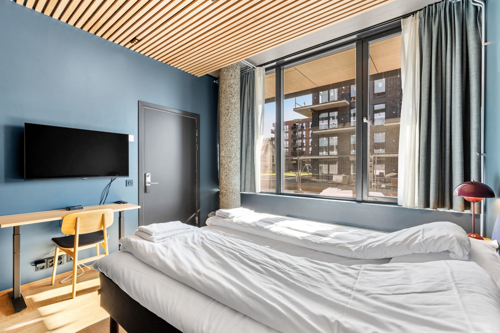 Gjesteleiligheten styres av resepsjonisten og fungerer som et hotellrom. Galleribilde