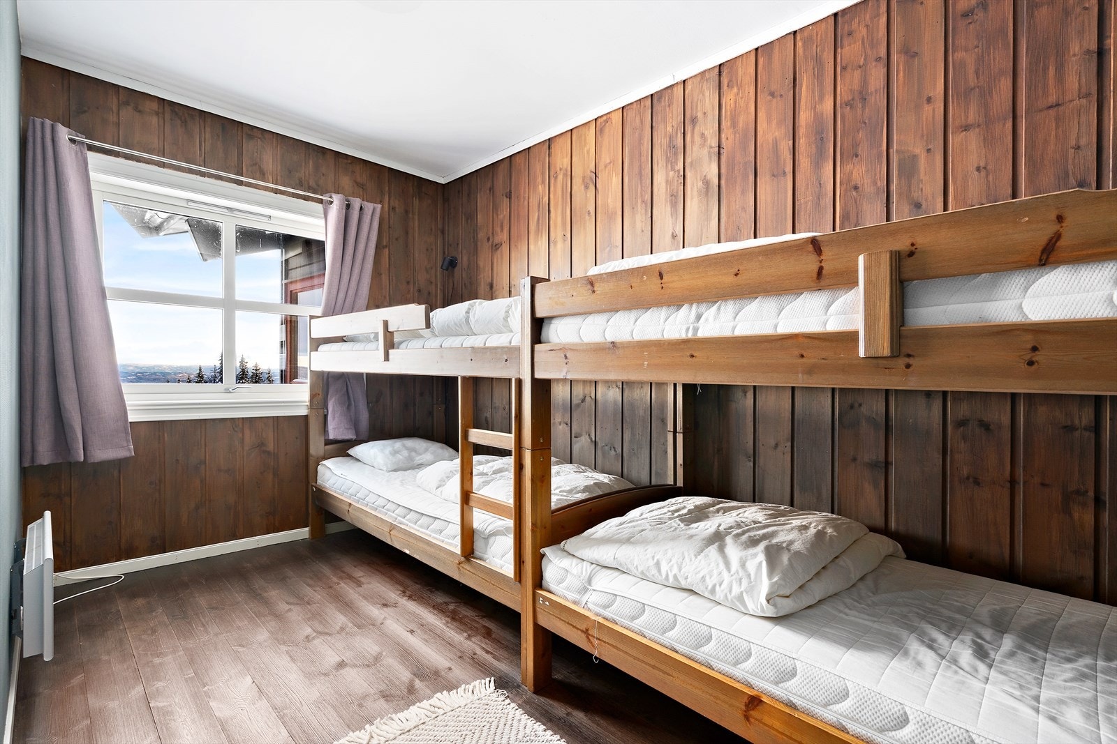 Leiligheten har tre soverom, hvor to har køyesenger for å optimalisere sengeplassene Galleribilde