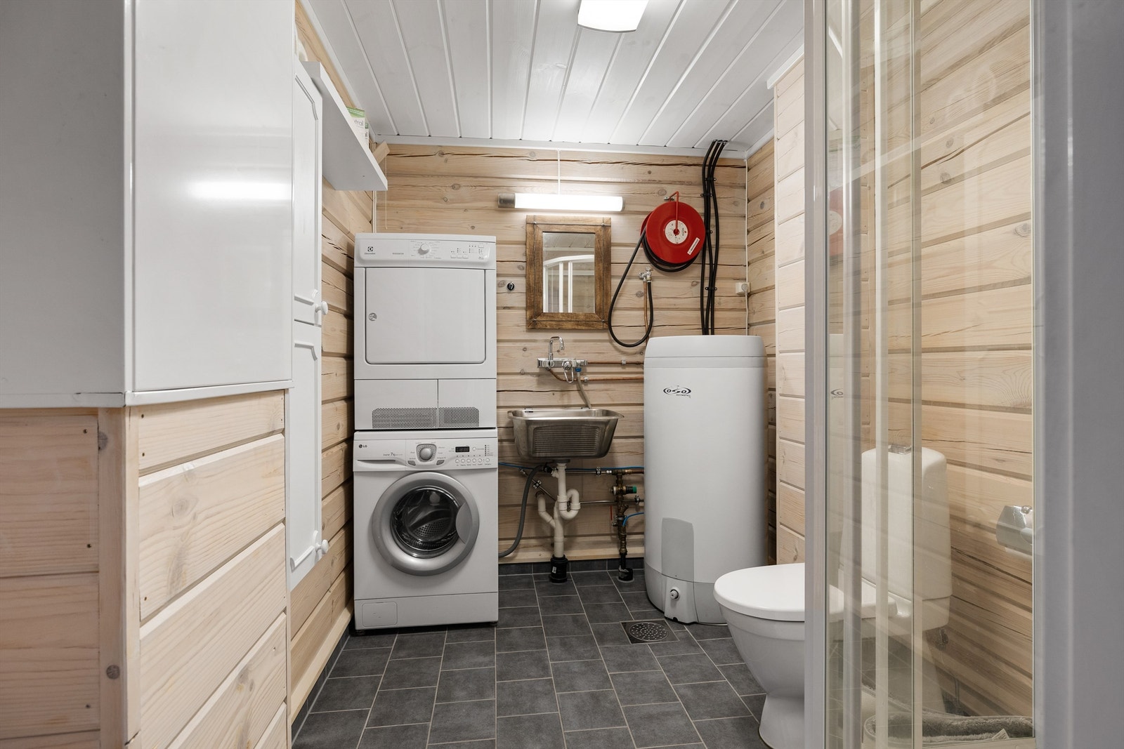 Her er det opplegg for vaskemaskin og tørketrommel. Galleribilde