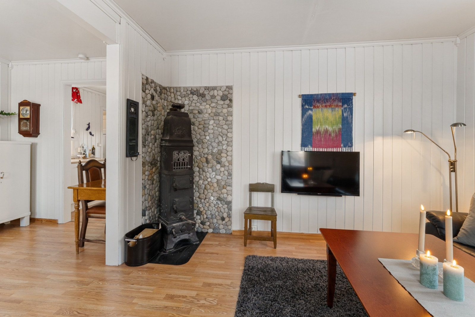 Med en lun atmosfære som forsterkes av den sjarmerende vedovnen. Galleribilde