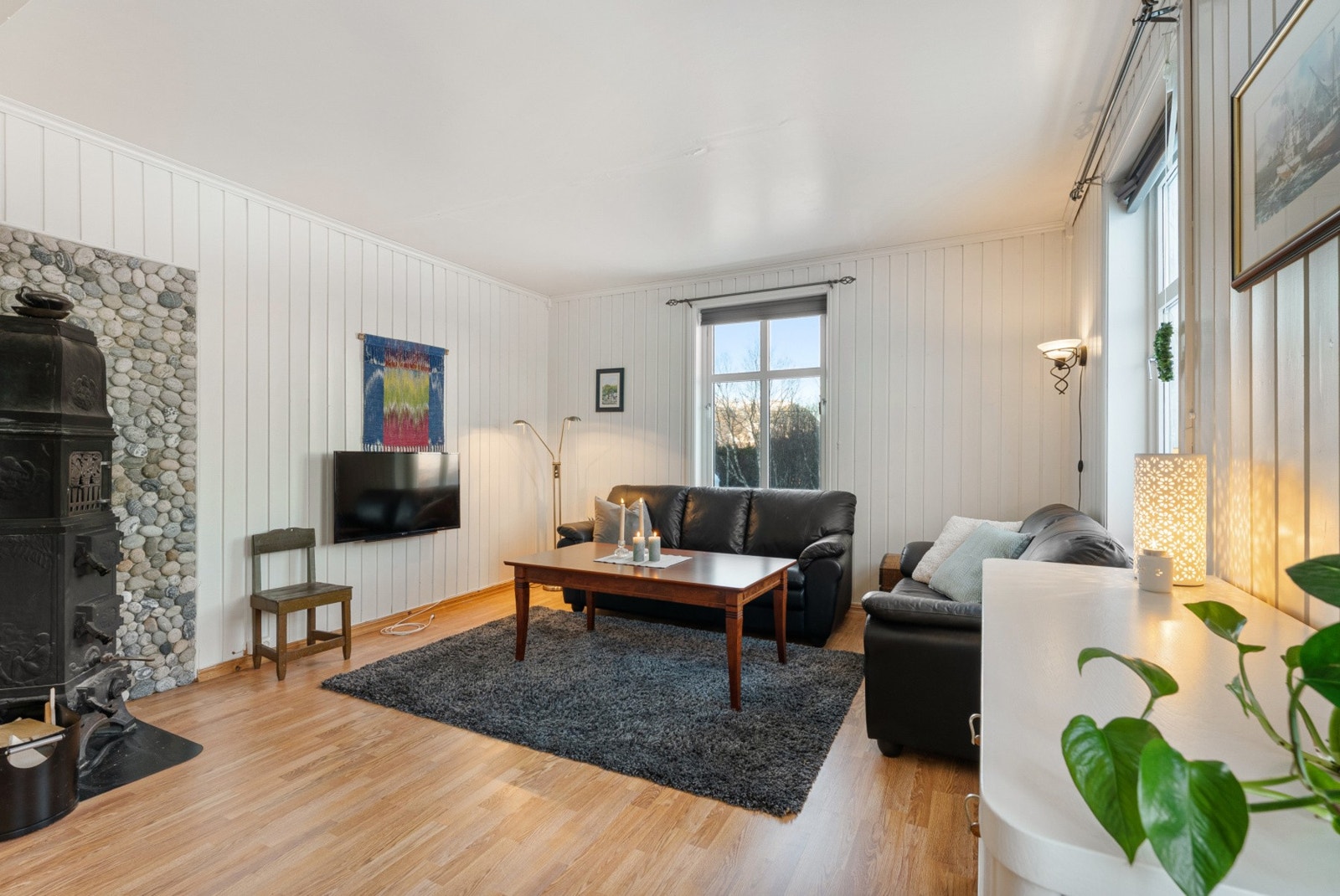 Dette er et rom skapt for hygge og samvær Galleribilde