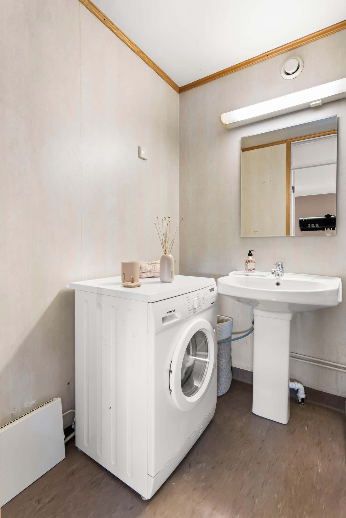 Opplegg for vaskemaskin på bad. Galleribilde