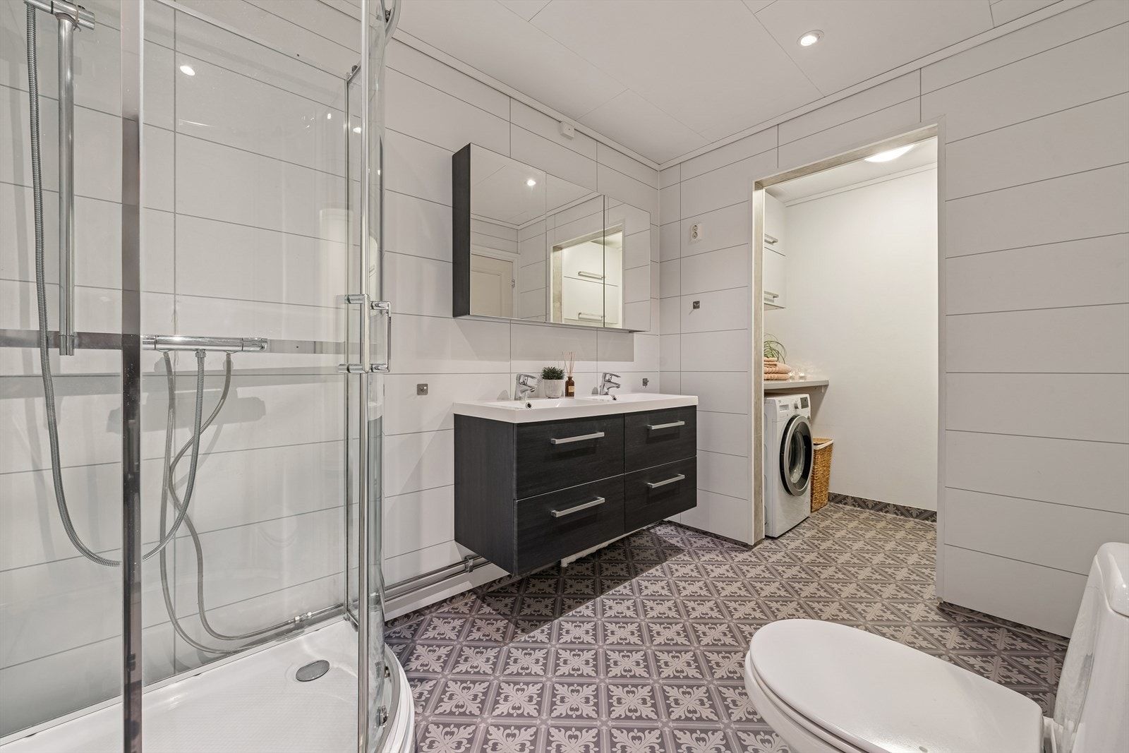 I tilknytning med badet har du et praktisk vaskerom. Galleribilde