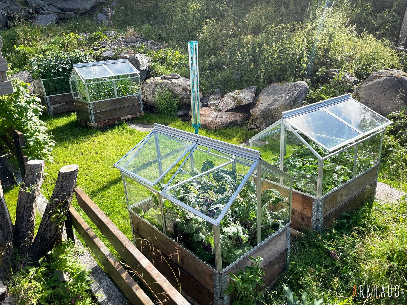 Kjøkkenhagen med 4 veksthus Galleribilde