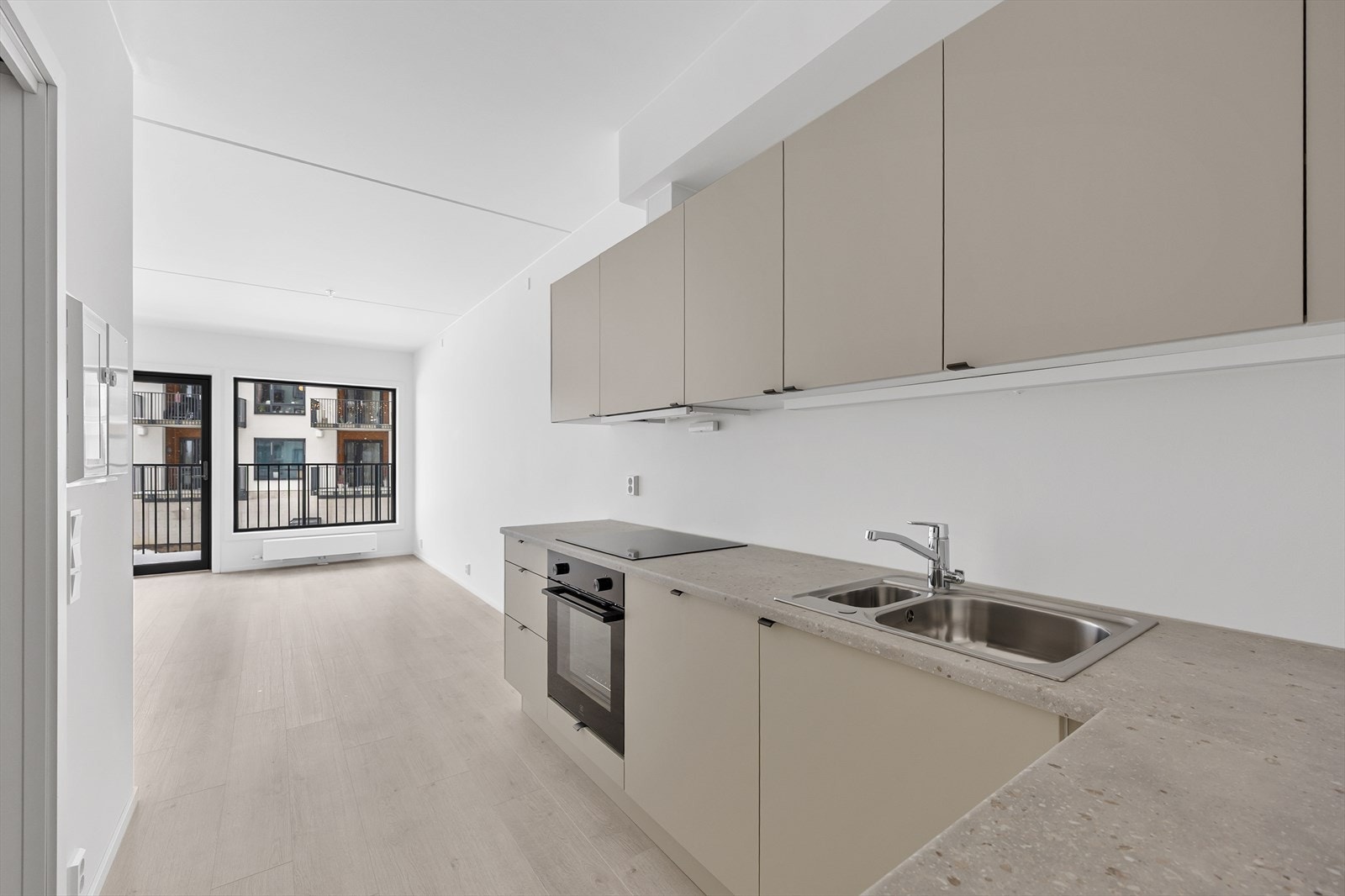 Leiligheten er helt ny og har en arealeffektiv planløsning med åpen stue- og kjøkkenløsning. Galleribilde