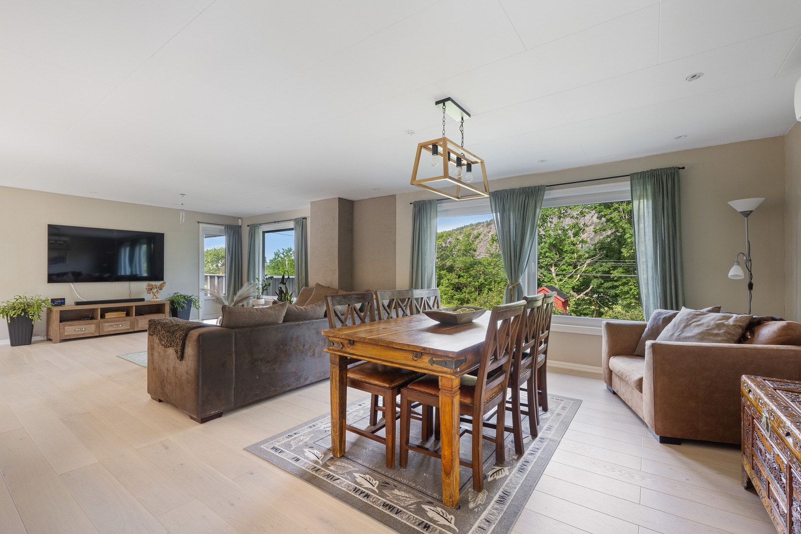 De ulike sonene glir naturlig over i hverandre og skaper et sosialt hjem. Galleribilde