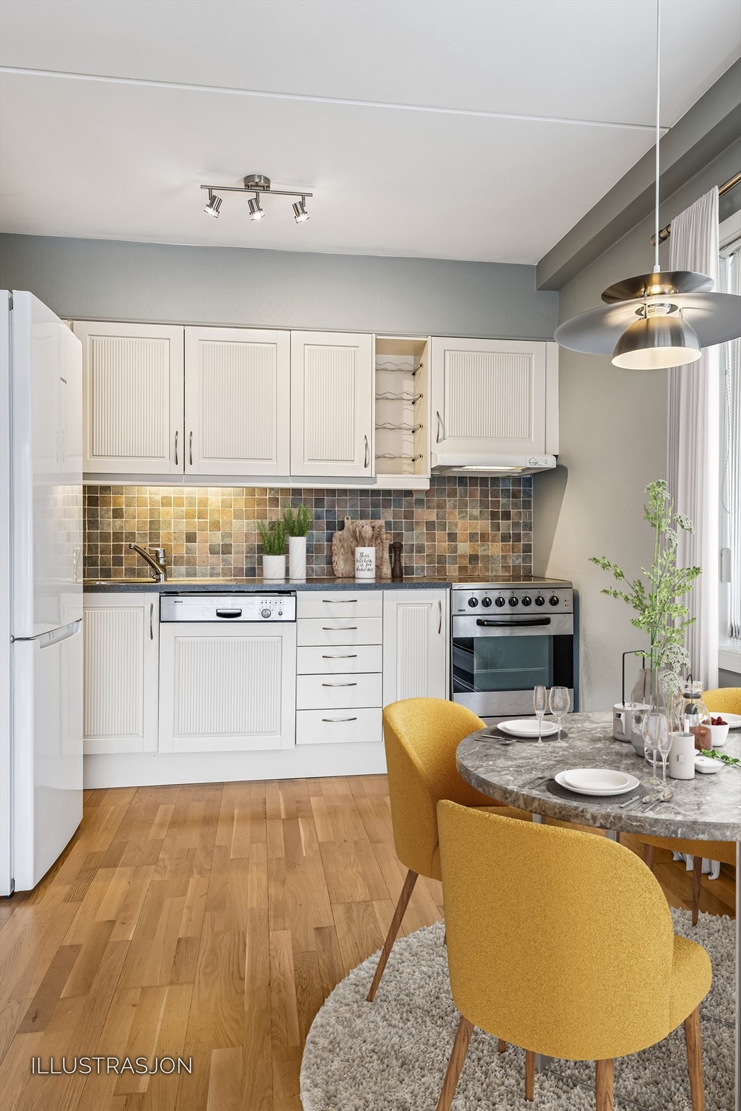 Kjøkkenet er i en effektiv og åpen løsning mot stuen, som illustrert her. Galleribilde