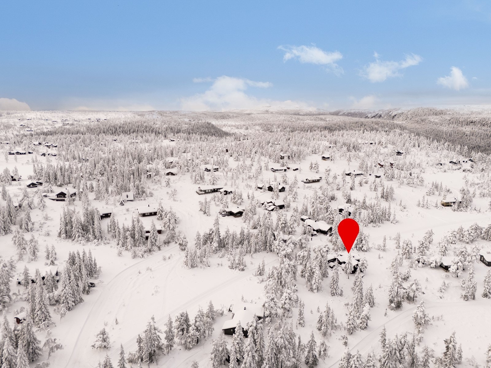 Oversiktsbilde. Løypene ses til venstre for hytta Galleribilde