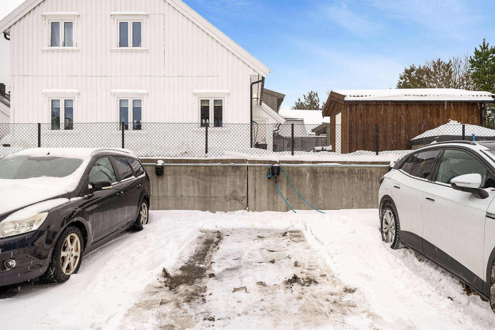 Fast p-plass med egen el-billader Galleribilde