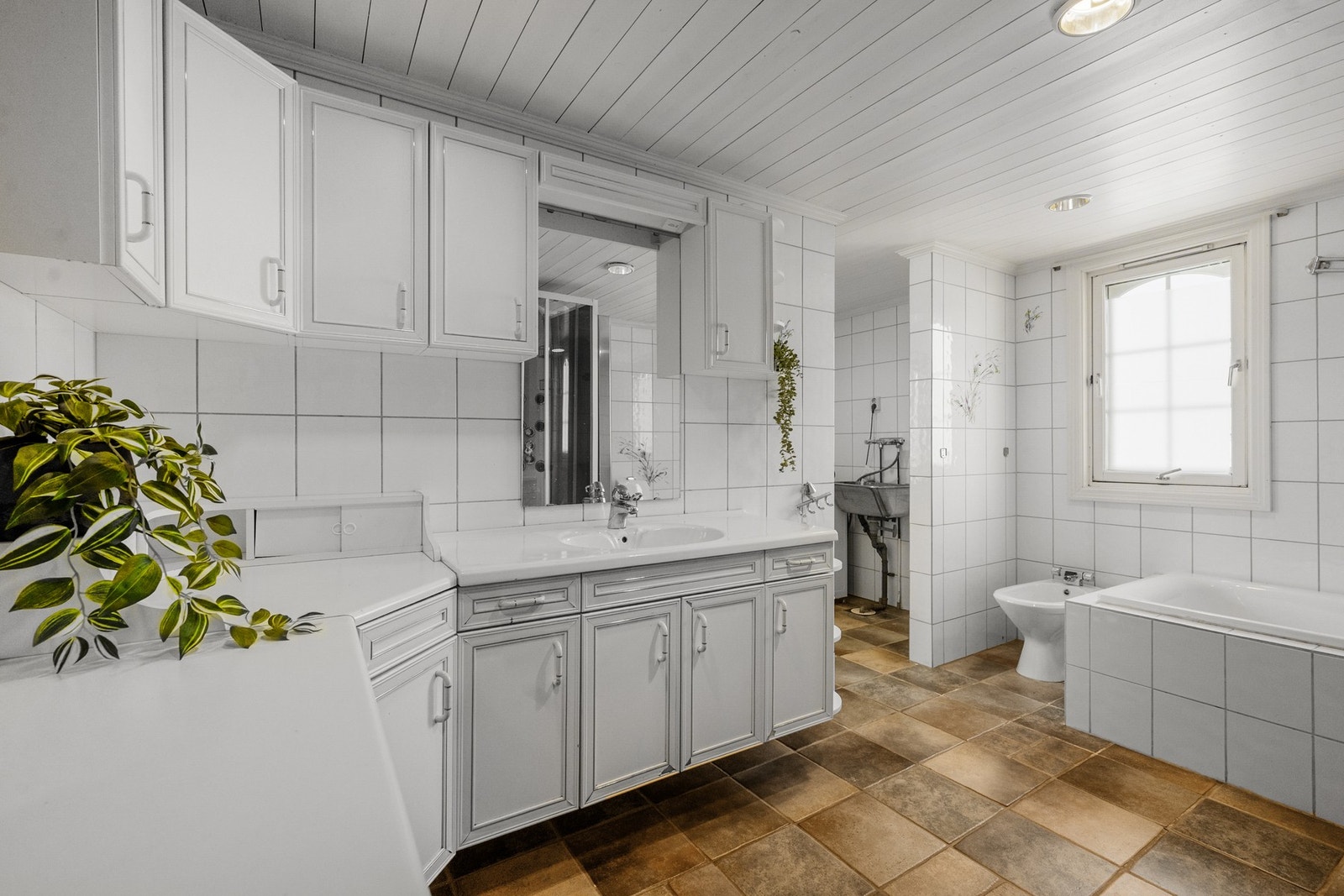 Opplegg for vaskemaskin på badet. Galleribilde