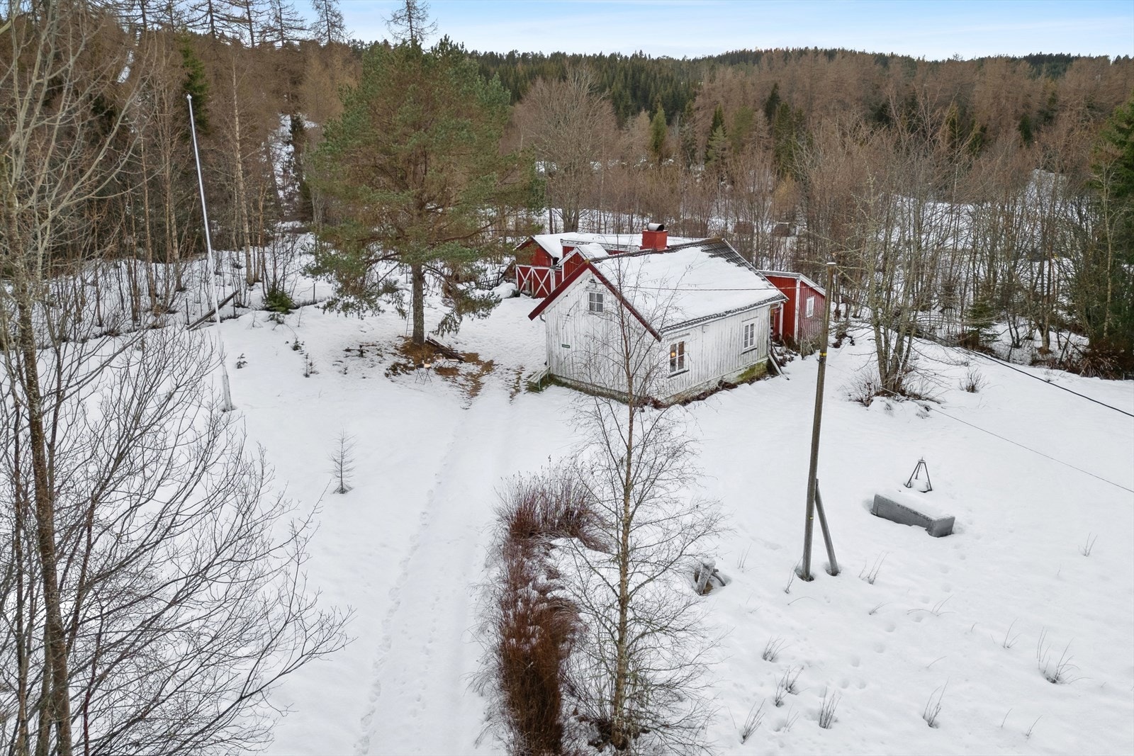 En enebolig med flere uthus beliggende på Sverresborg, like ved Ferista. Galleribilde