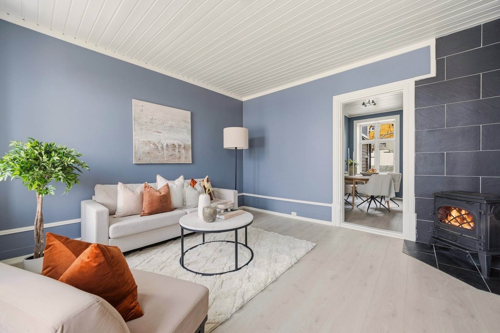 Peis bidrar til en lun og hyggelig atmosfære Galleribilde