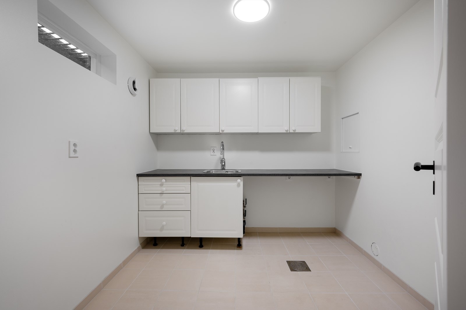 Praktisk vaskerom i utleiedel. Galleribilde