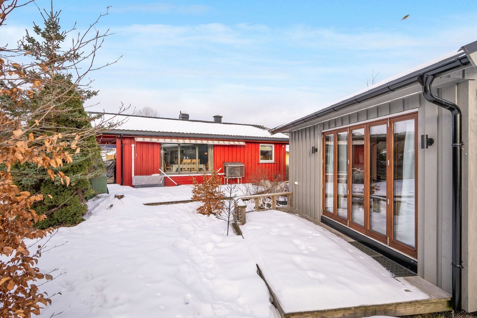 Her har man i tillegg et isolert uthus som er meget praktisk for en familie Galleribilde