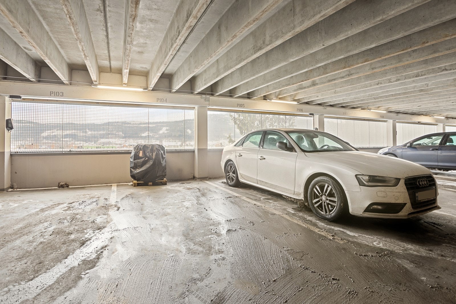 Det medfølger en garasjeplass med mulighet for elbillader Galleribilde