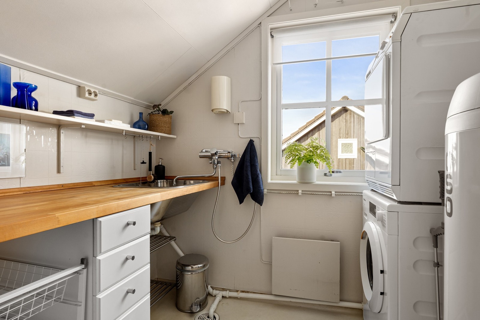 I øverste etasje er det også et separat vaskerom Galleribilde