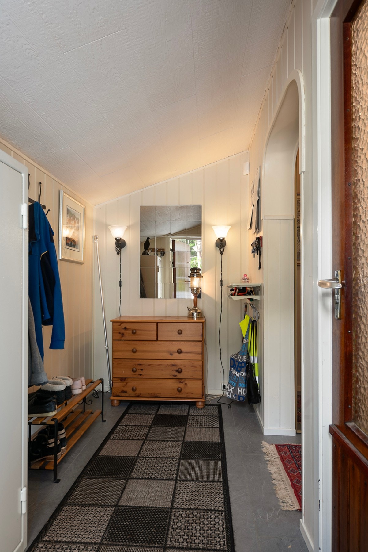 Velkommen inn i en lys og innbydende entré Galleribilde