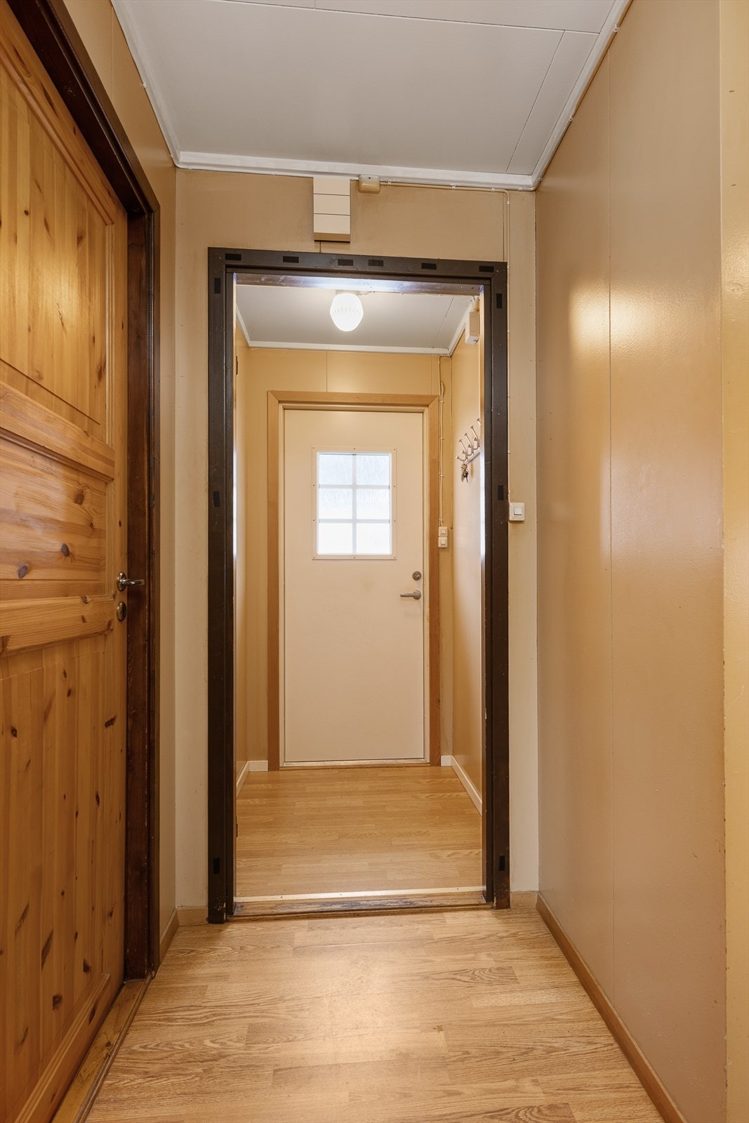 God plass til å ta av sko og yttertøy i inngangspartiet. Galleribilde