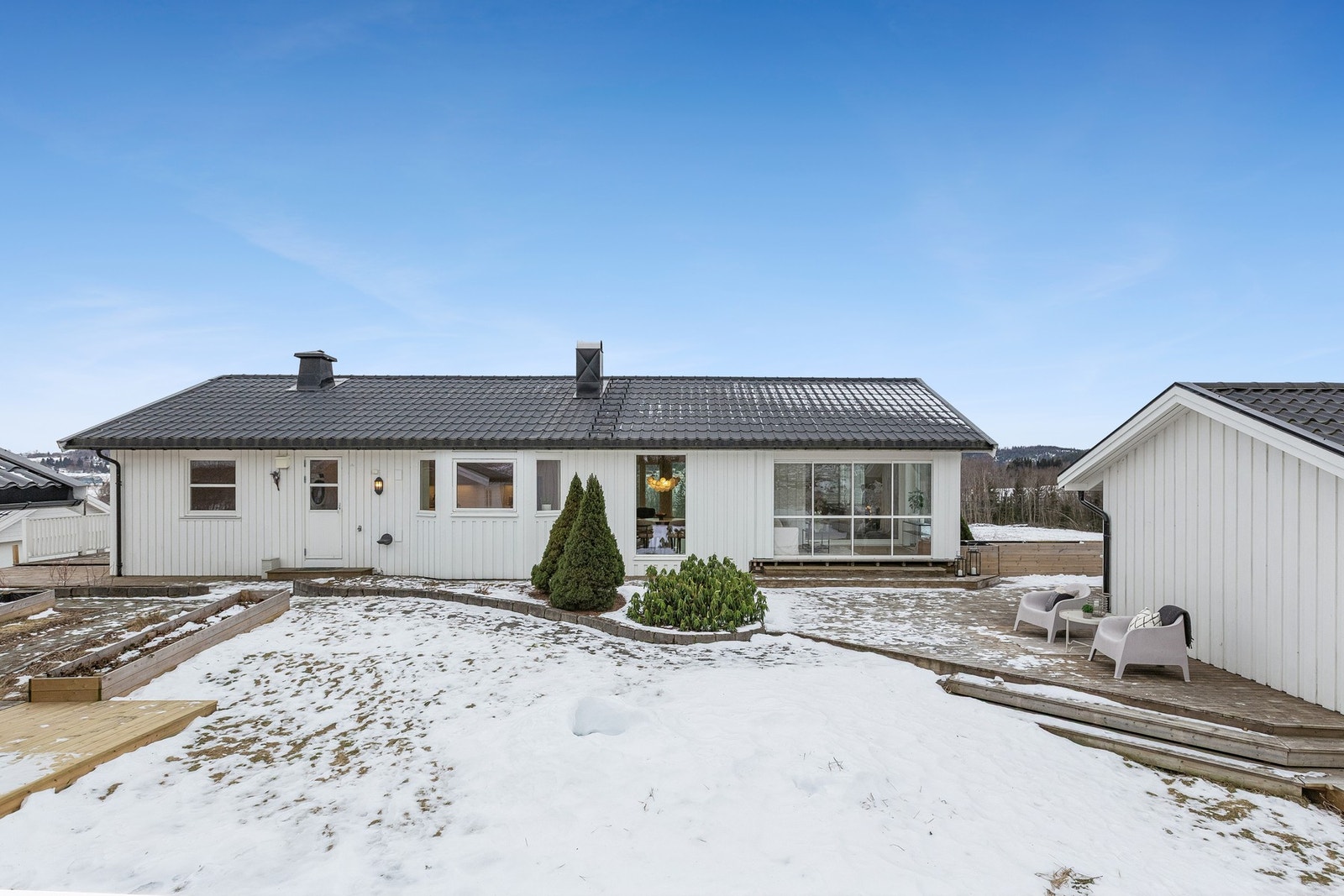 Har har man en påkostet enebolig med flotte og praktiske løsninger Galleribilde