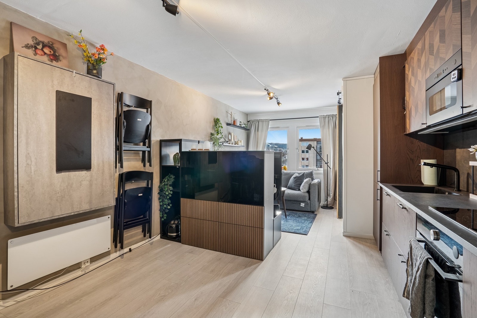 Kombinert stue- og kjøkkenløsning på 21,1 kvm. Galleribilde