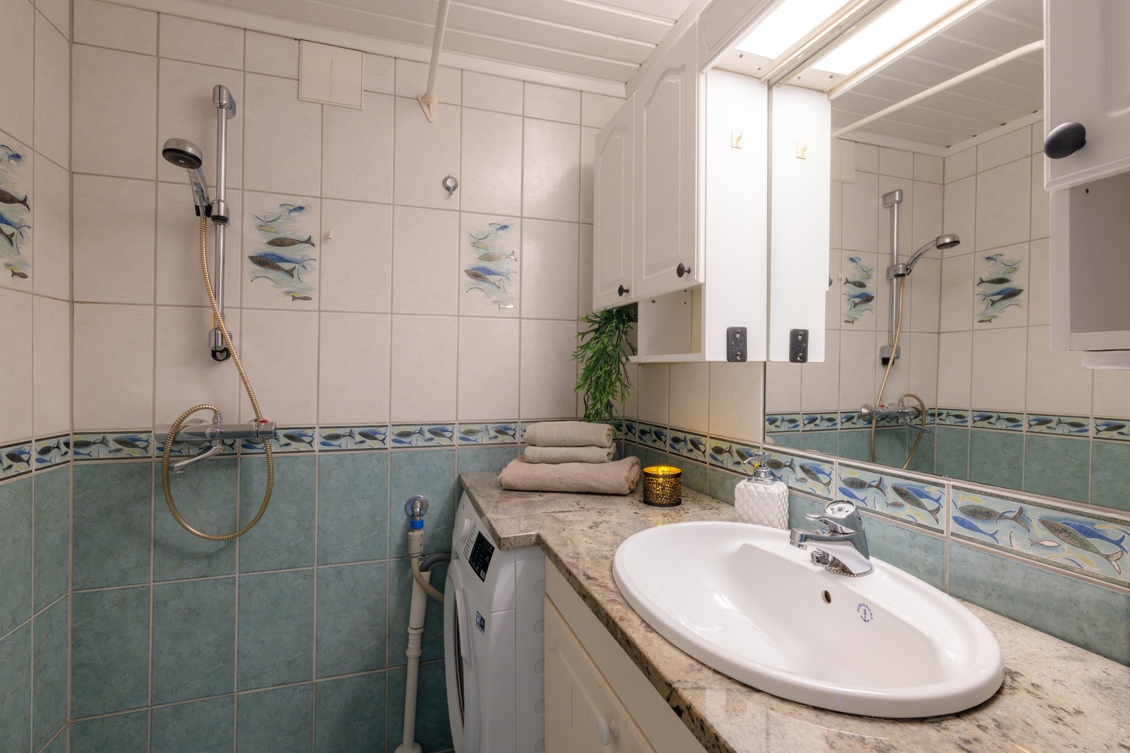 Flislagt bad med gulvvarme. Galleribilde