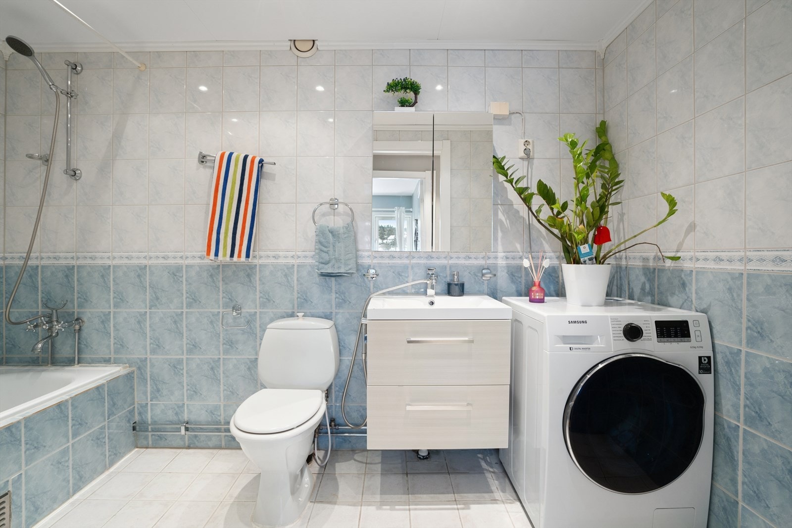 Badet har opplegg for vaskemaskin. Galleribilde