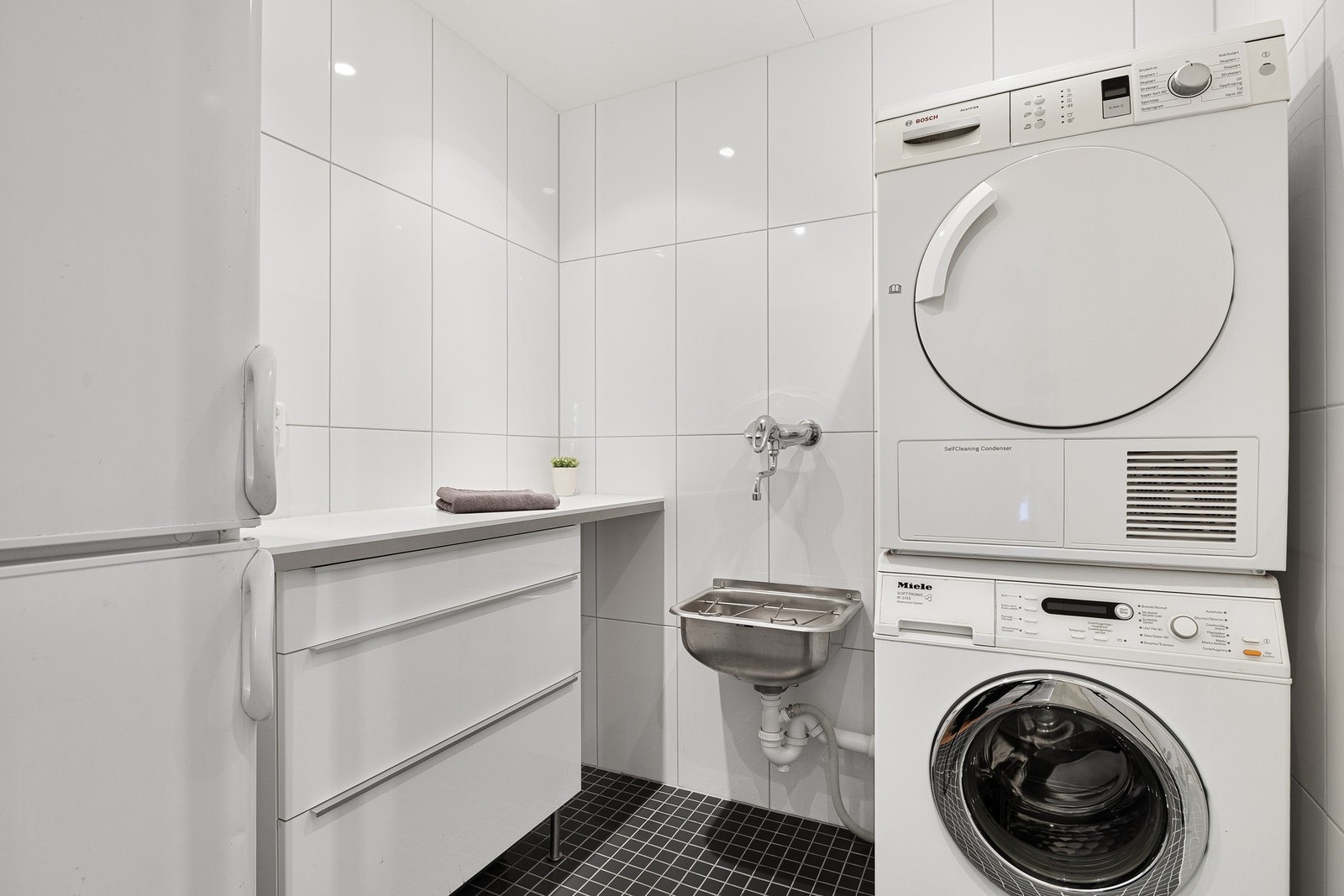 Her får du i tillegg til 2 bad et eget praktisk vaskerom. Galleribilde