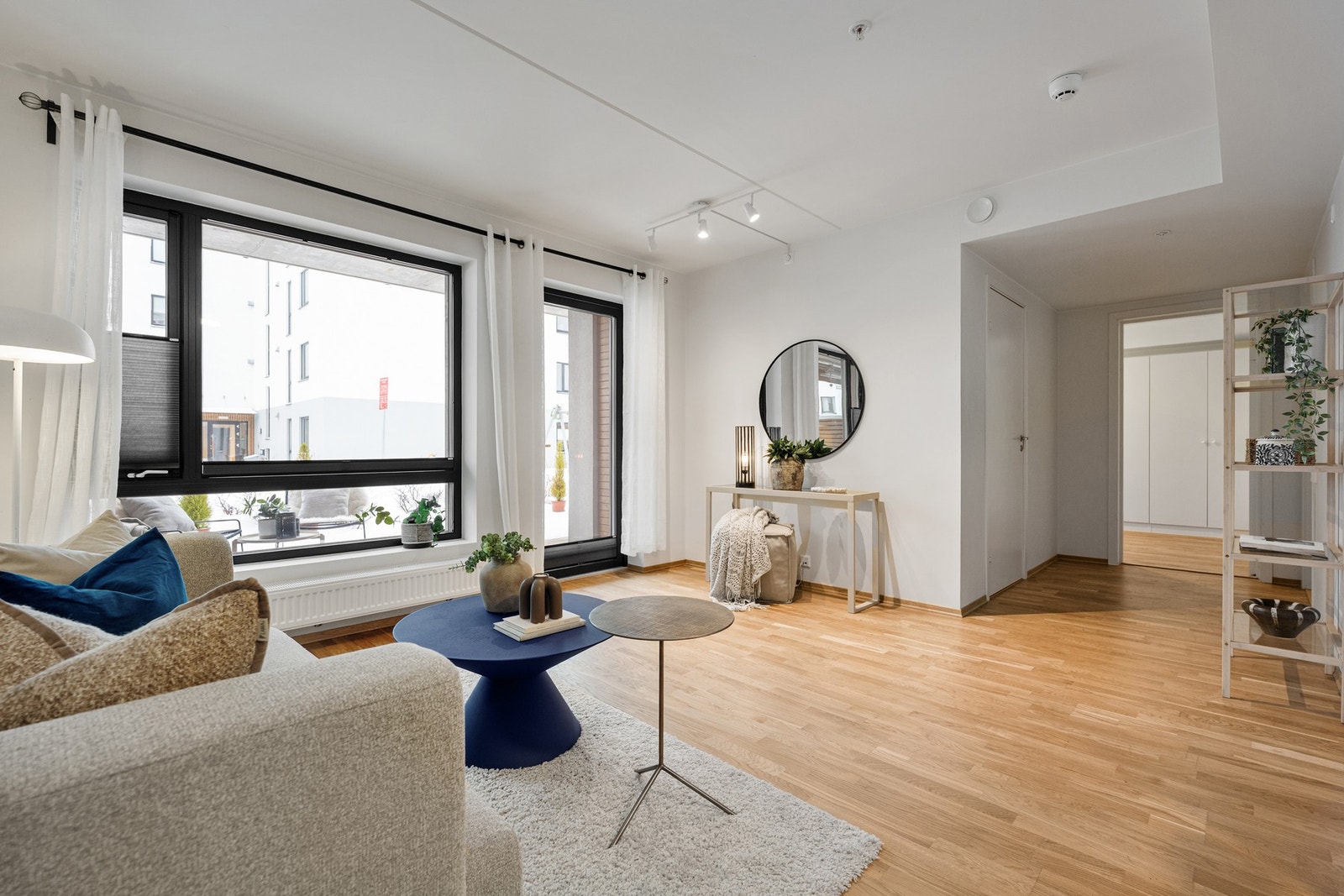 Stilren 3-roms med 21 kvm terrasse og p-plass i garasje. Galleribilde