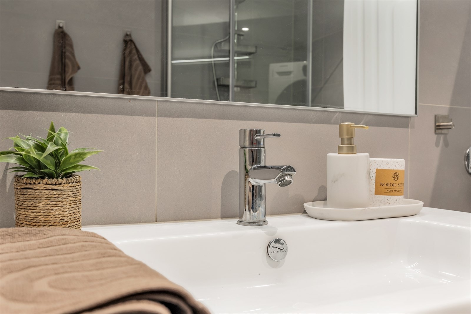 Balansert ventilasjon med avtrekk sikrer et godt inneklima på badet Galleribilde