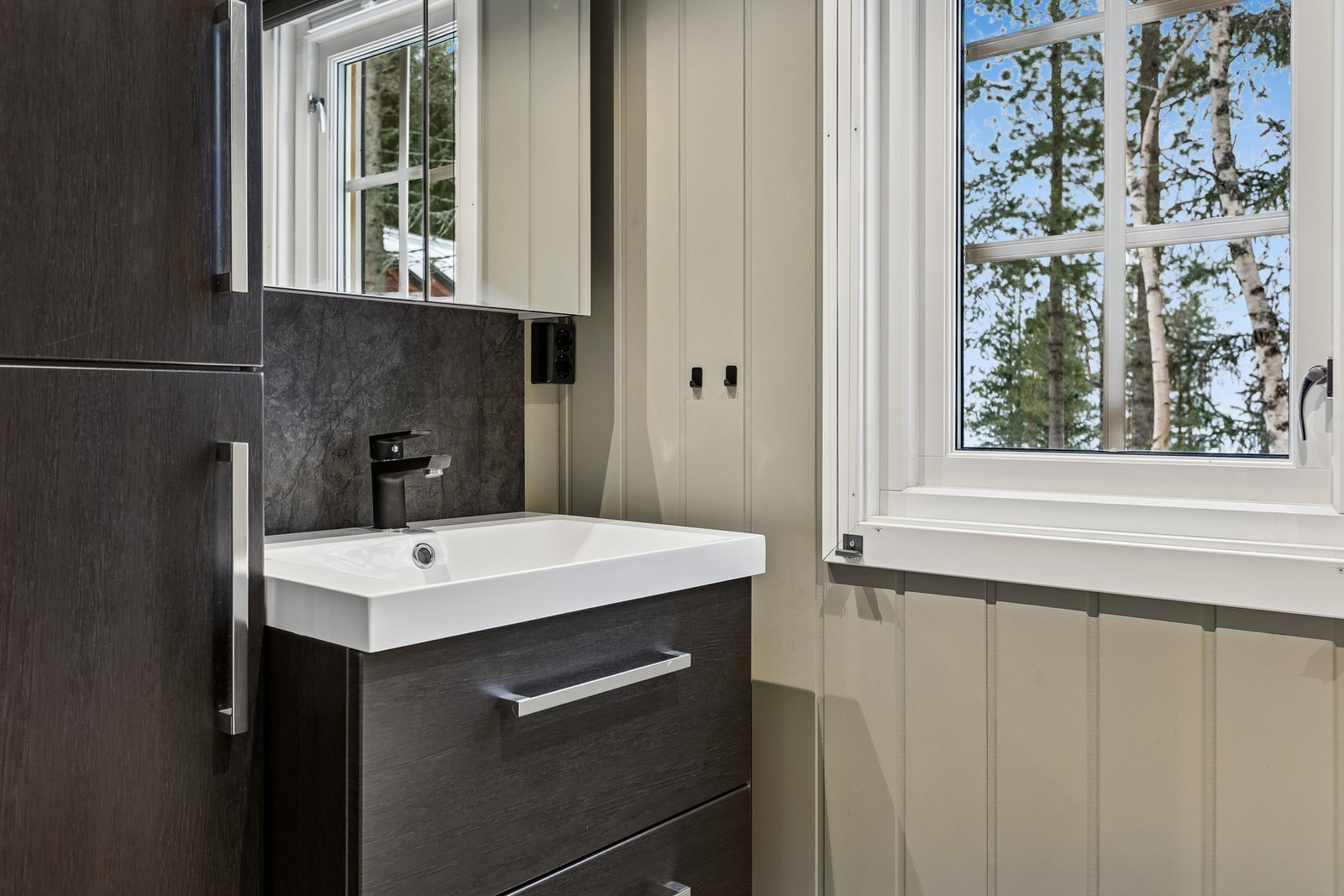 Badet har et gjennomgående stilrent design. Galleribilde