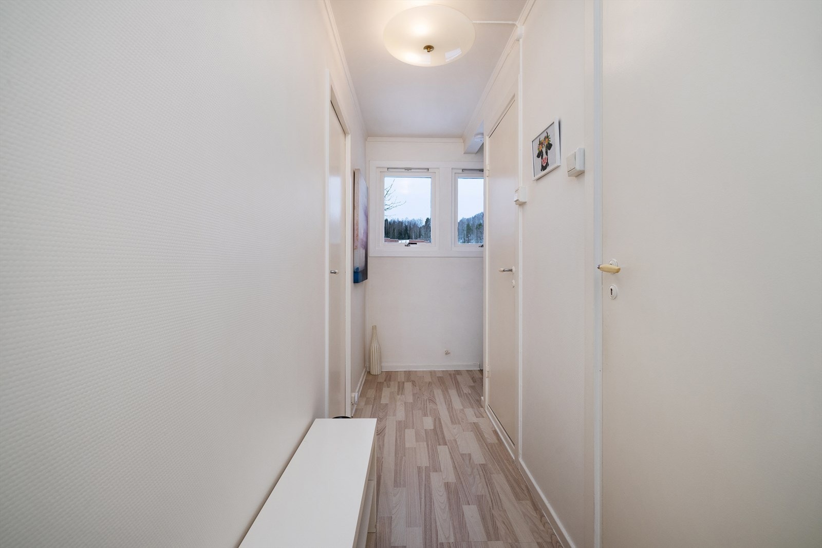 Gangen i andre etasje binder sammen soverommene og badene. Galleribilde