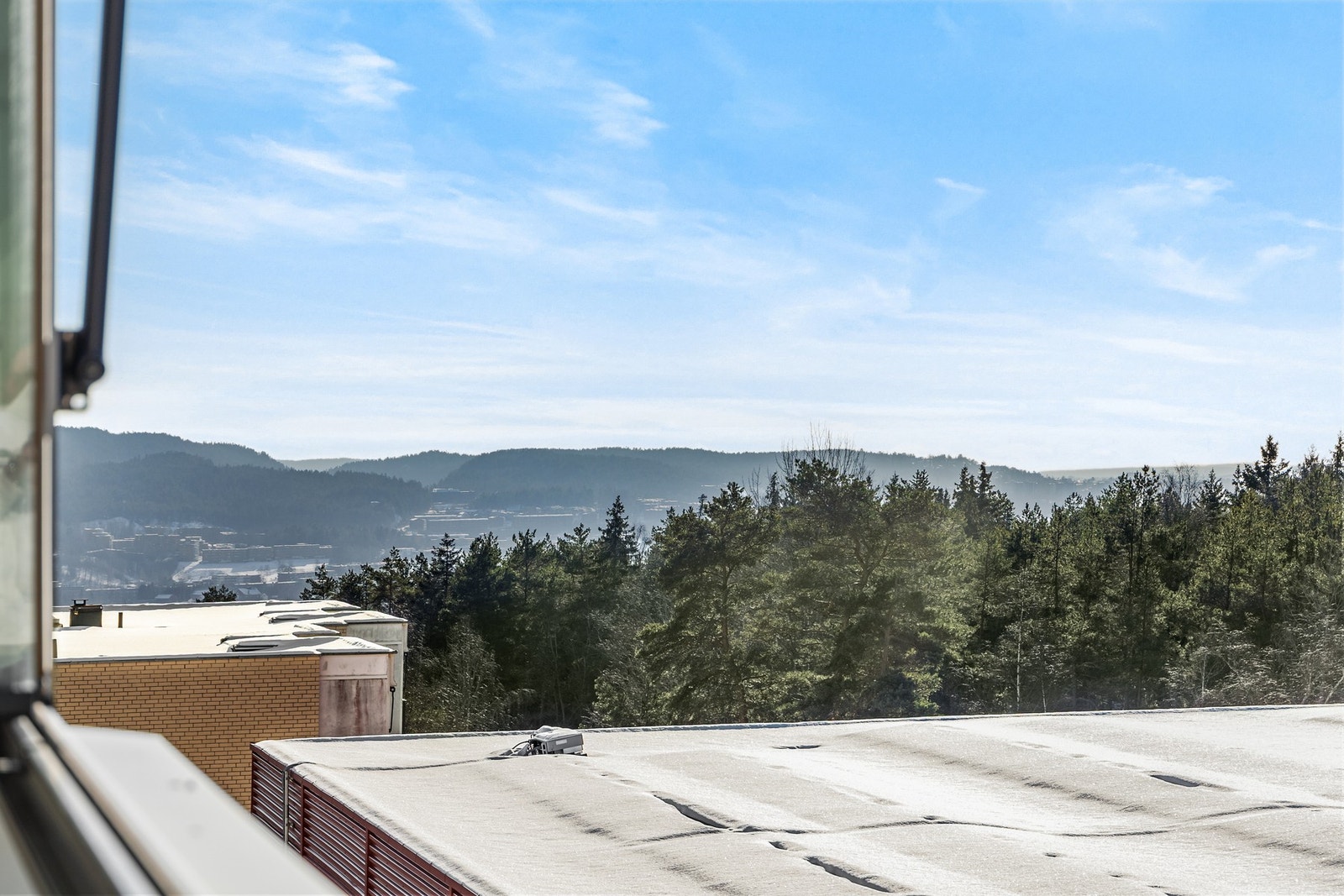 Utsikt mot by, retning Alna Galleribilde