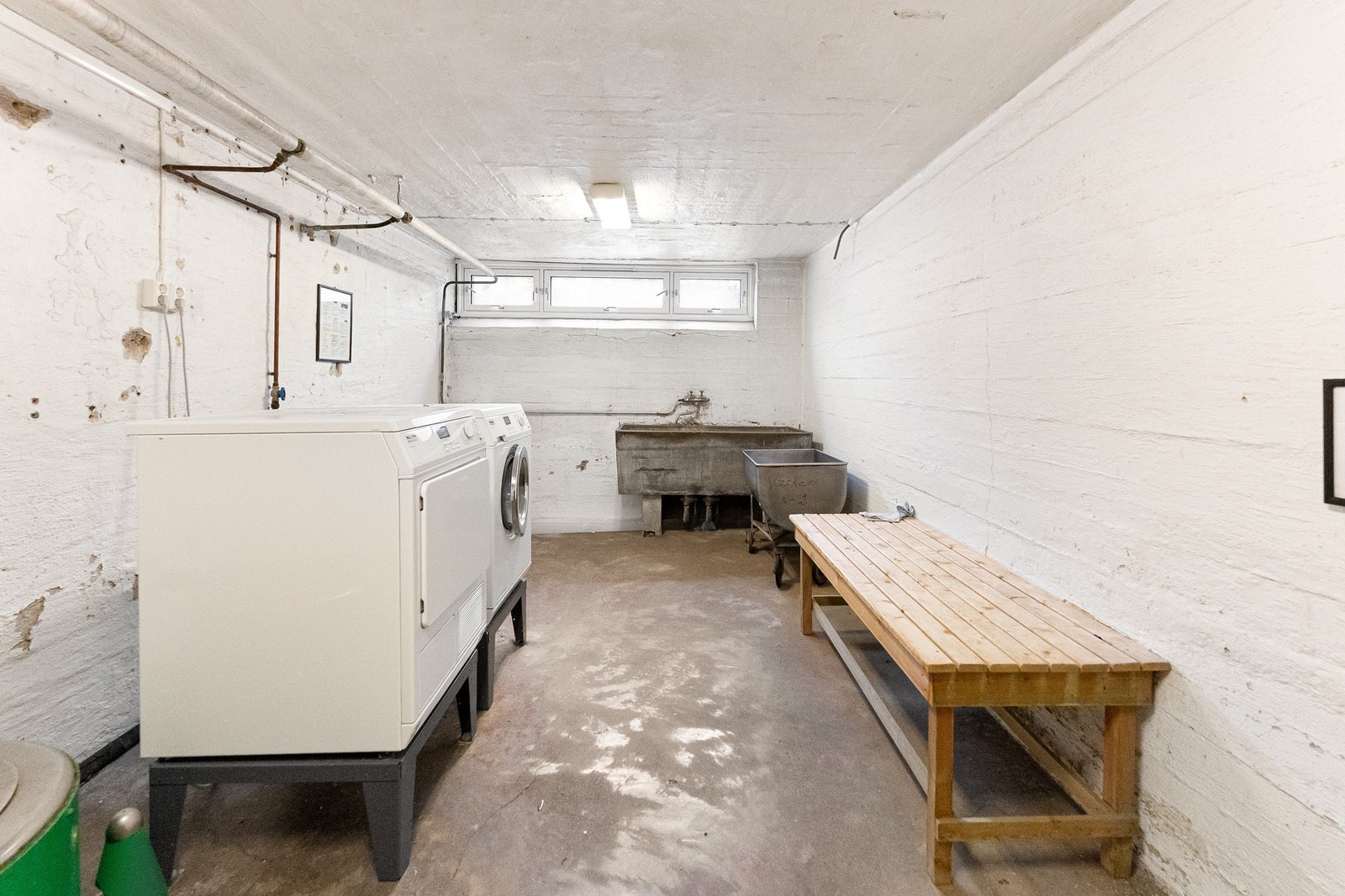 Aksjelaget har felles vaskerom. Galleribilde