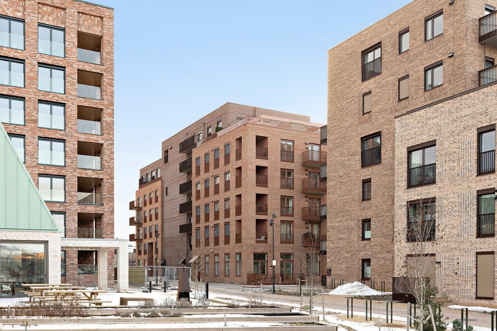 Her bor du i et moderne bomiljø som kombinerer det beste av urbant liv med naturskjønnhet. Galleribilde