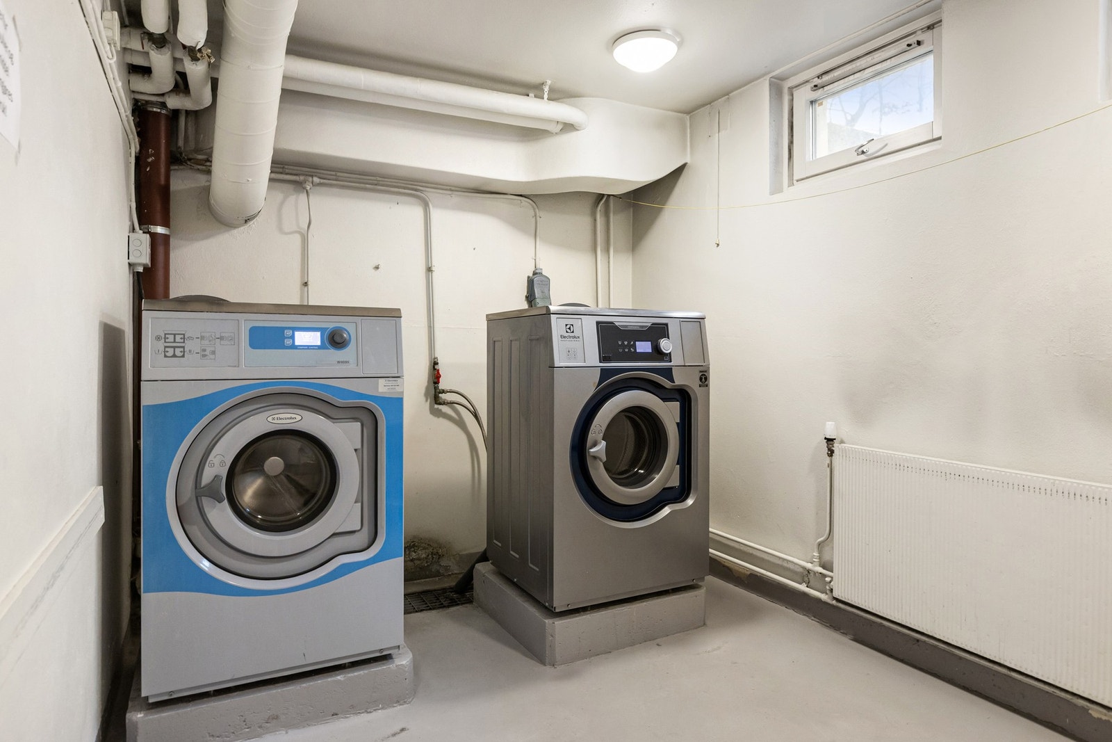 Videre er det også et fellesvaskeri for beboerne i bygget. Galleribilde