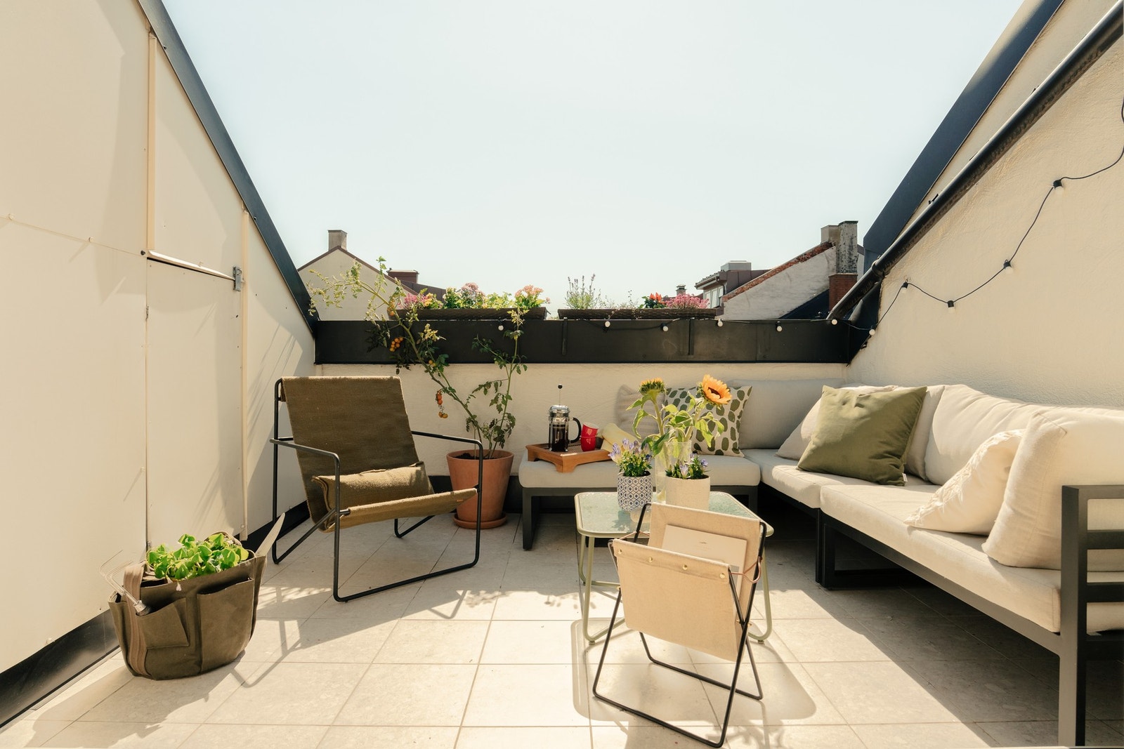 Nyt soldagene som snart kommer på en privat sydvendt taketrrasse. Galleribilde