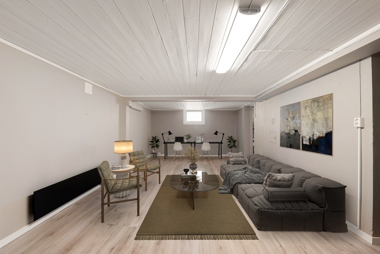 Dette store kjellerrommet har i senere år vært benyttet som stue, men er ikke godkjent for varig opphold. Bildet er digitalt møblert. Galleribilde