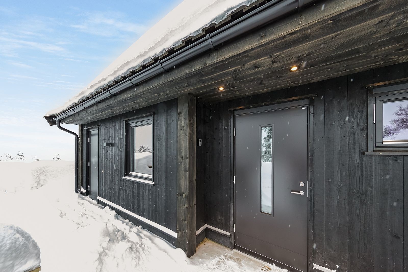 Inngangsparti samt inngang til bod Galleribilde