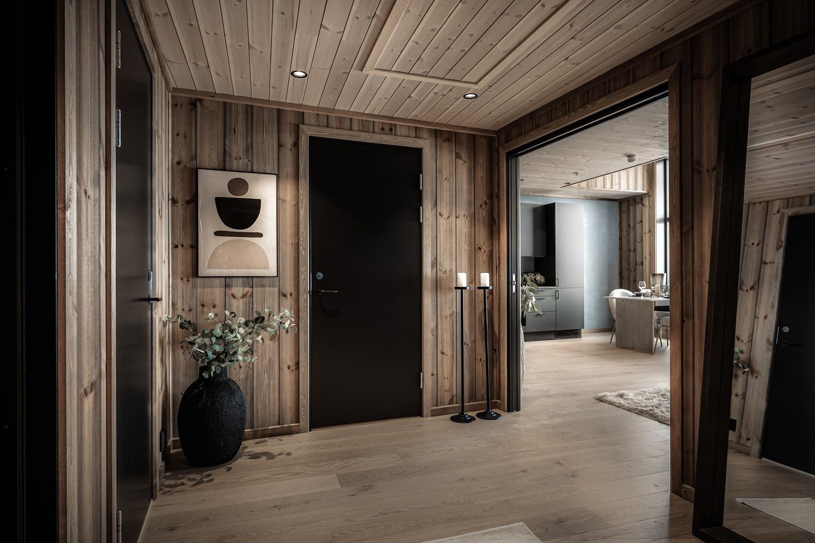 Gangen har soverommene fordelt på hver side og et stort helfliset bad i enden. Videre inngang til stue og kjøkken Galleribilde