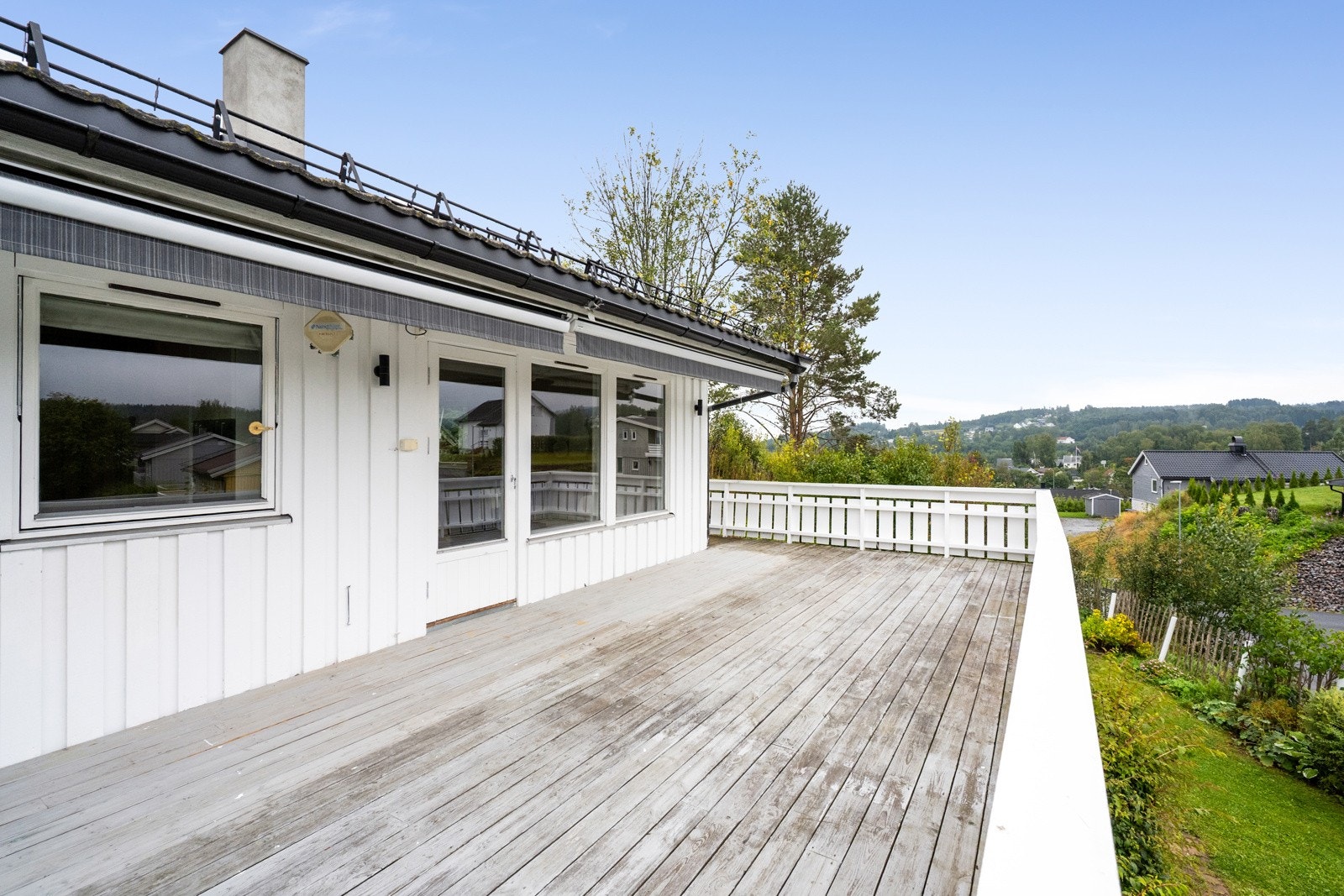 Terrassemarkise ved stuevinduene Galleribilde