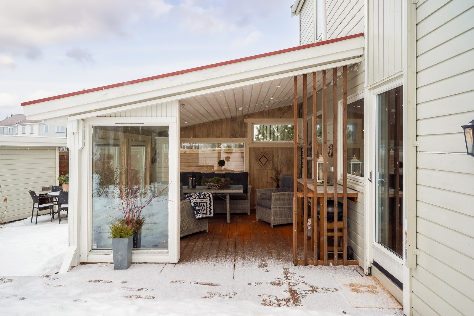 Fin utestue som fungerer som en naturlig forlengelse av stuen Galleribilde
