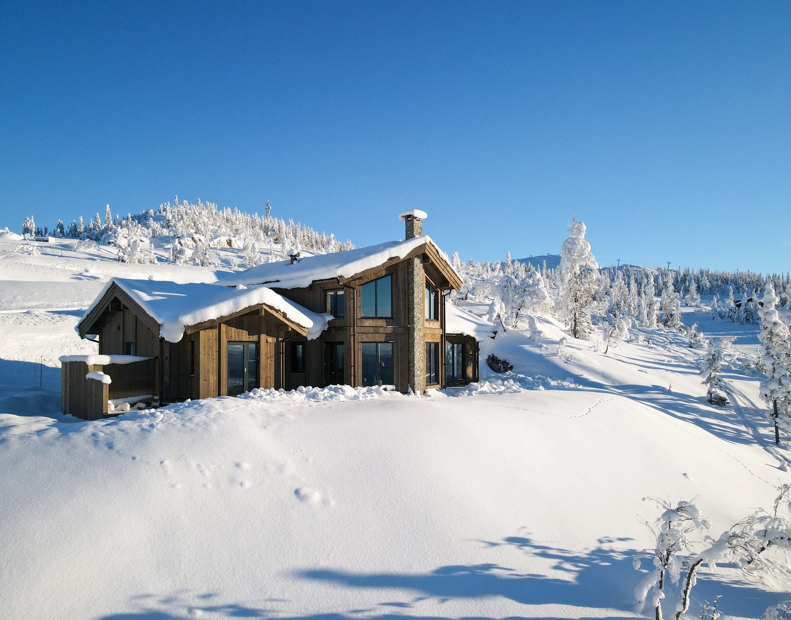 MWC selger sin flotte visningshytte med tilvalg fra øverste hylle, ferdig møblert av interiørarkitekt Galleribilde