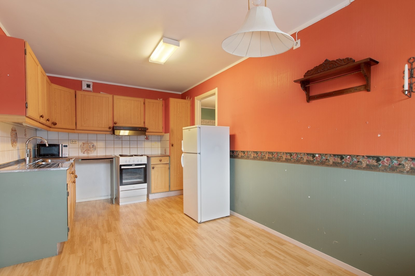 Kjøkkenet ligger separat og har utgang til den ene balkongen. Galleribilde