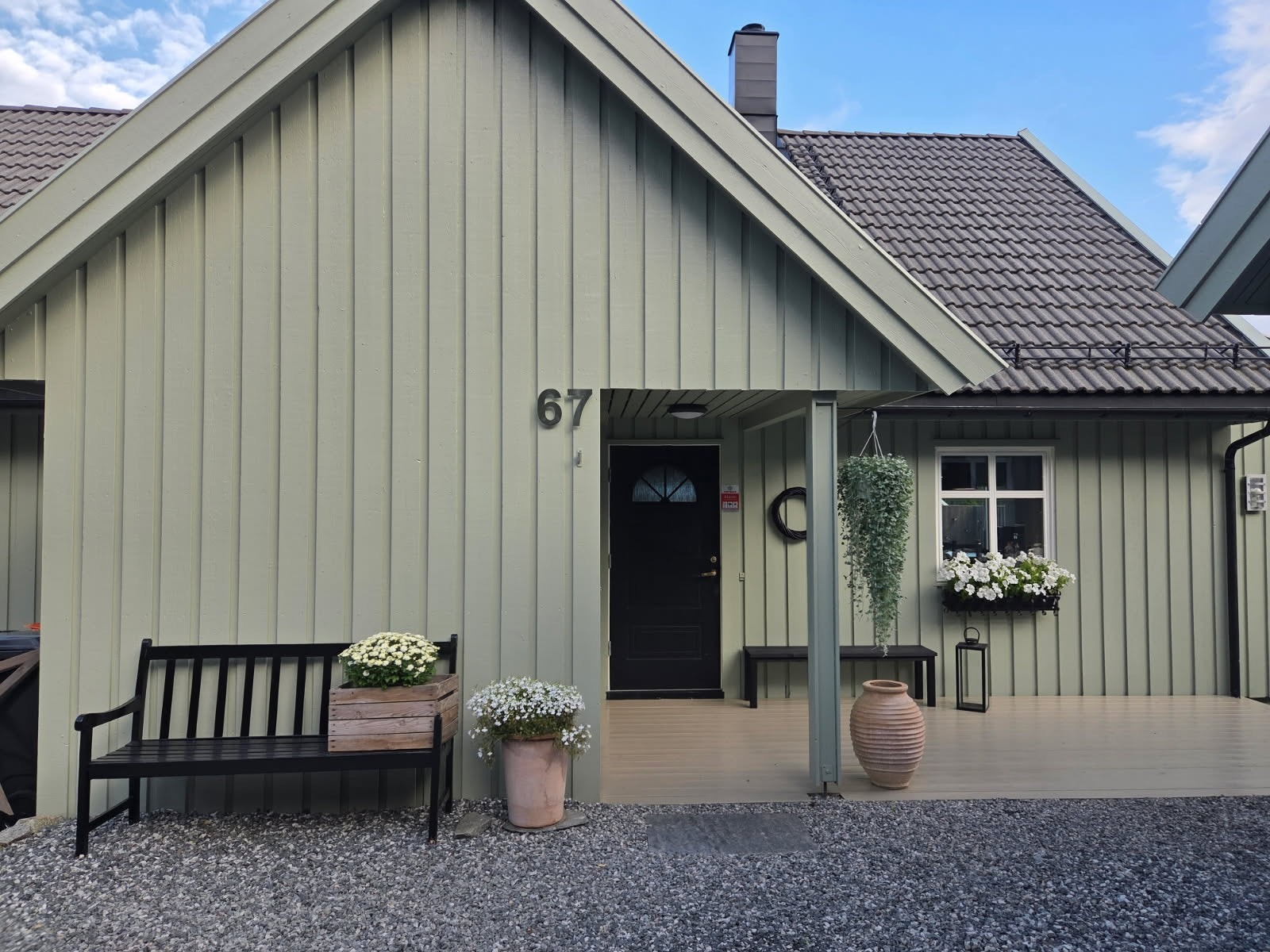 Koselig overbygget inngangsparti Galleribilde