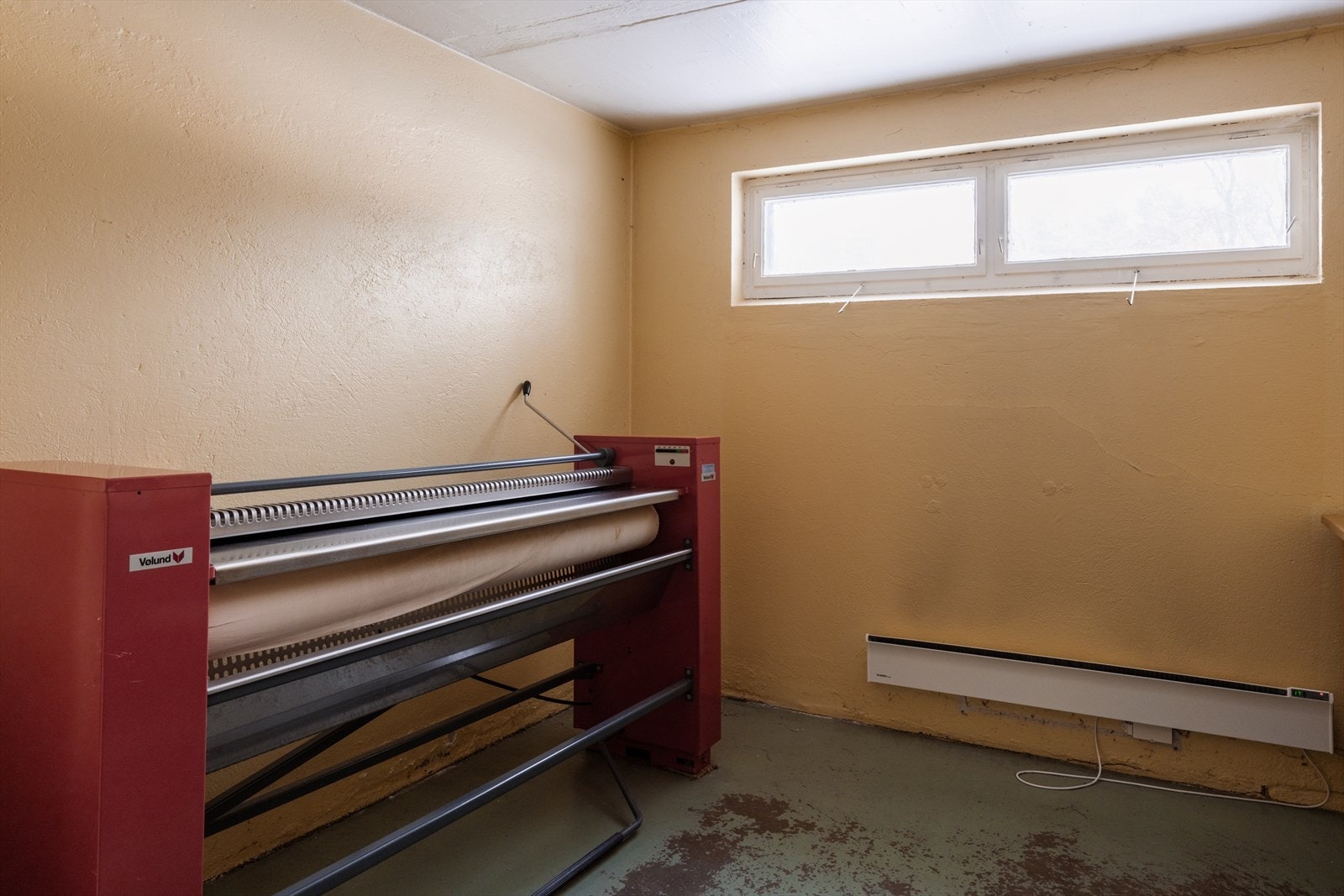 Her finnes også en praktisk rulle for sengetøy og duker. Galleribilde