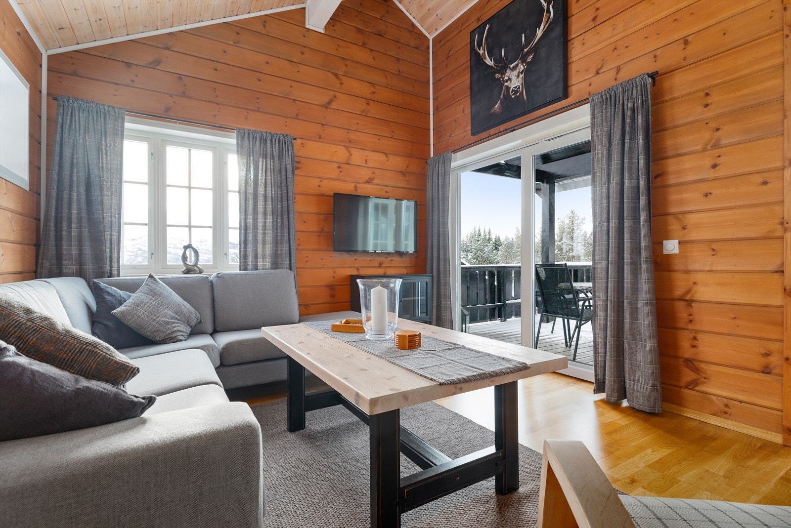 Stue som inviterer til ro og hygge Galleribilde