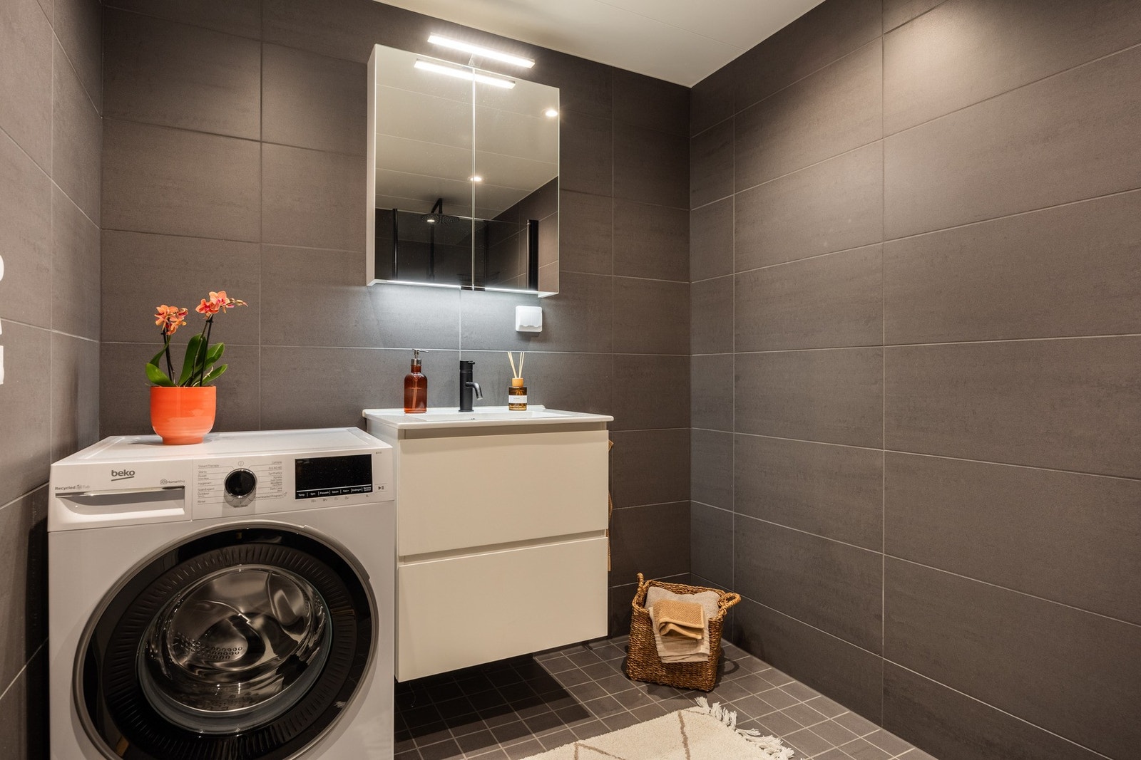 Badet har opplegg for vaskemaskin. Galleribilde