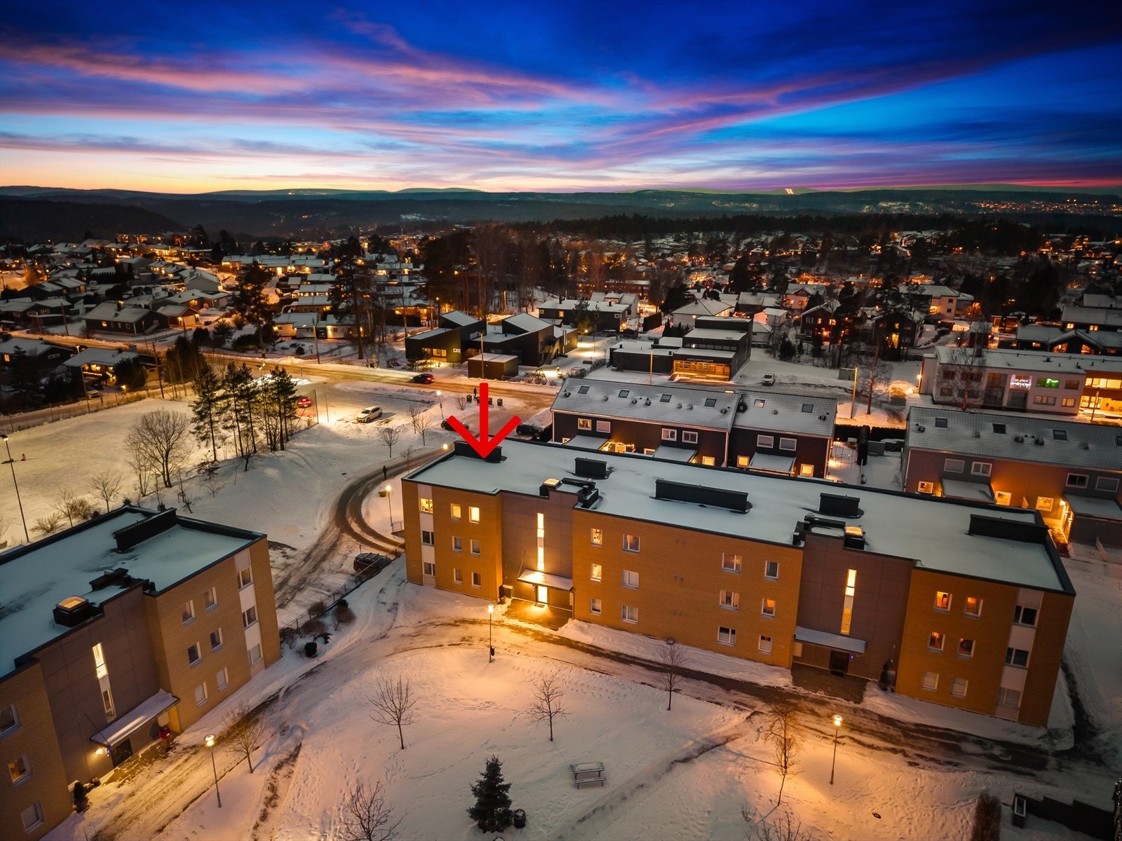 Kornmoenga har pene og lave leilighetsbygg i tillegg til romslige rekkehus Galleribilde