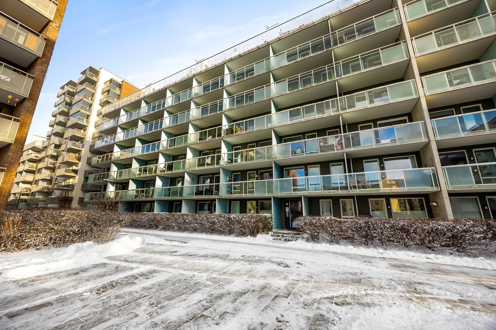 Boligbygg oppført med konstruksjoner i betong, stål og tre. Galleribilde