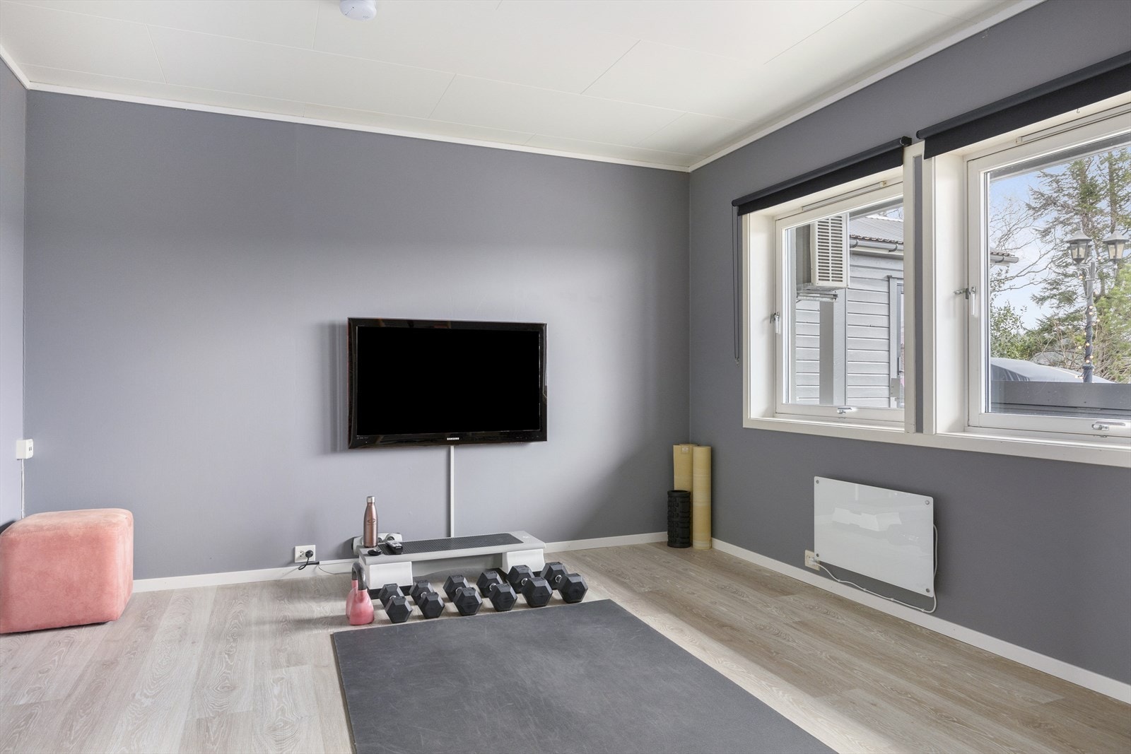 Ett av rommene i underetasjen brukes i dag som treningsrom Galleribilde